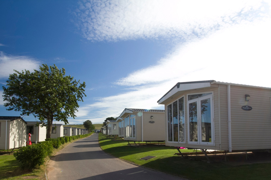 Photo of a neighborhood of manufactured housing.