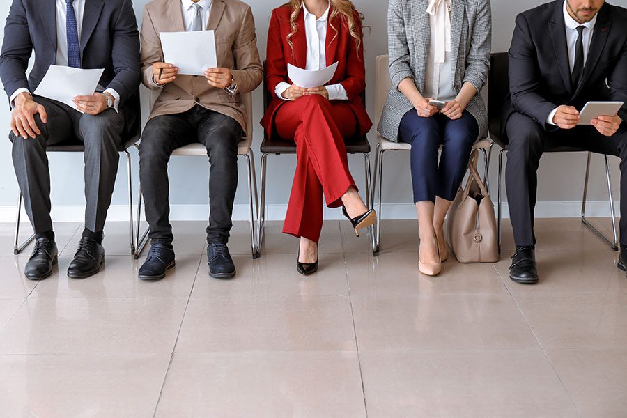 Young people waiting for job interview indoors