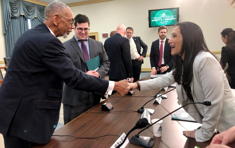 Leticia ColondeMejias meets and shakes hands with Representative Rush.