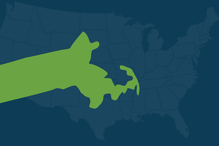 A map of the United States in the background with the state of Massachusetts in green in the front
