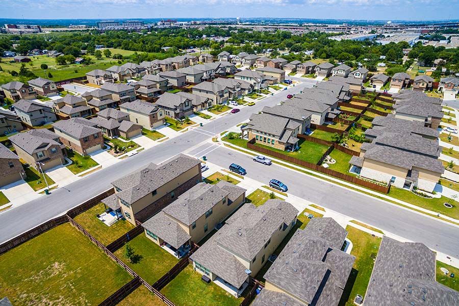 Overhead view of a neighborhood with many homes