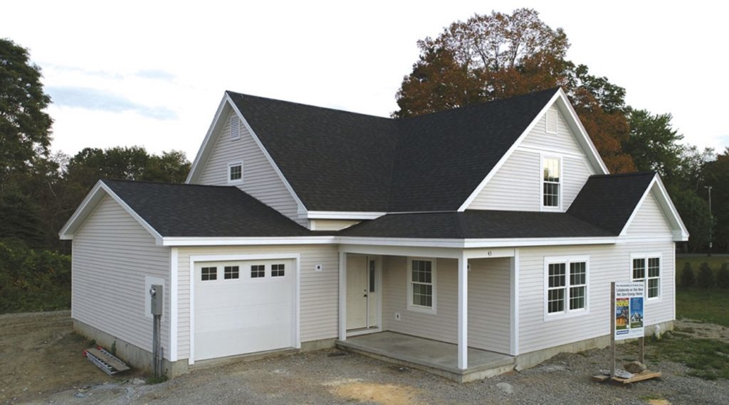 Newly constructed home with an attached garage.