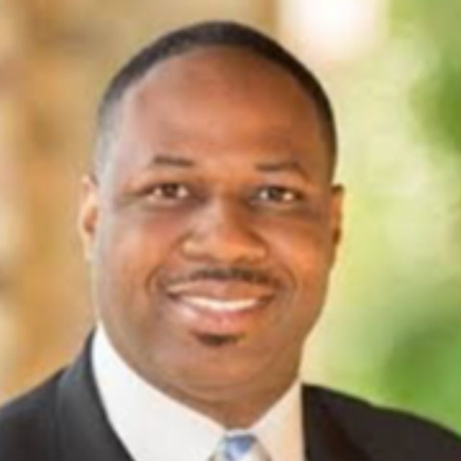 Headshot of Henry McKoy smiling.