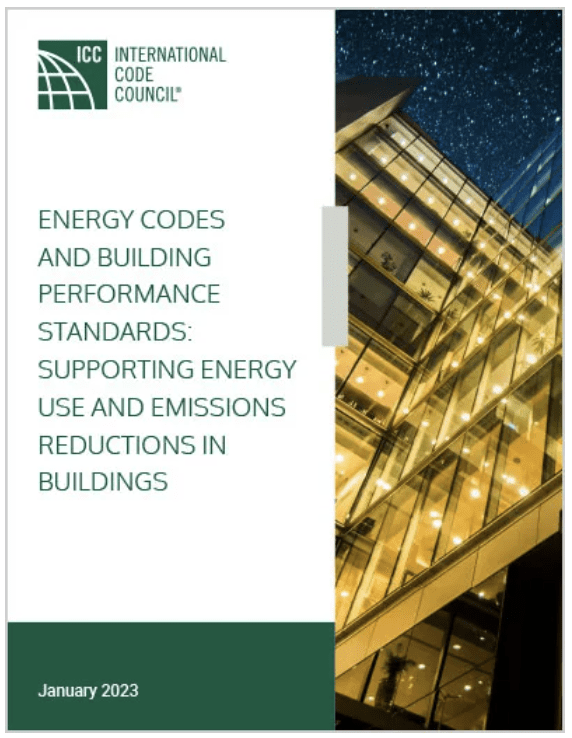 Cover for Energy Codes and Building Performance Codes guide showing an office building lit up at night.