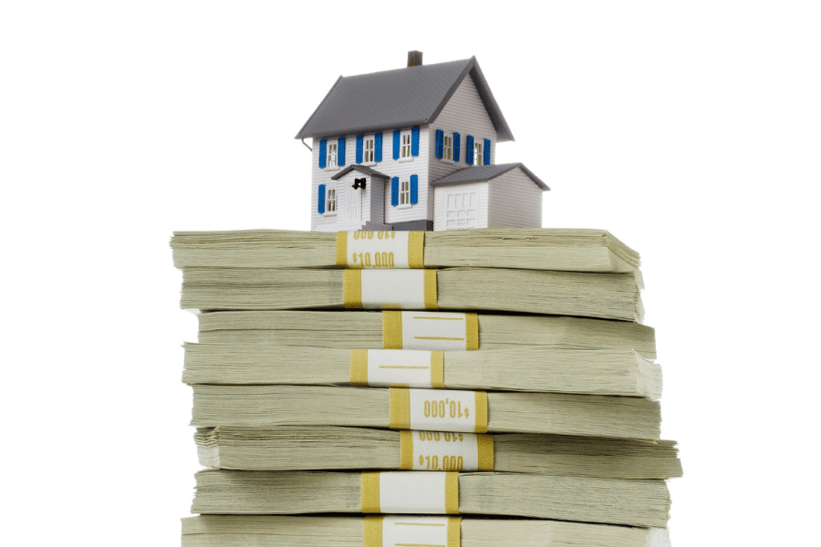 House on stack of money