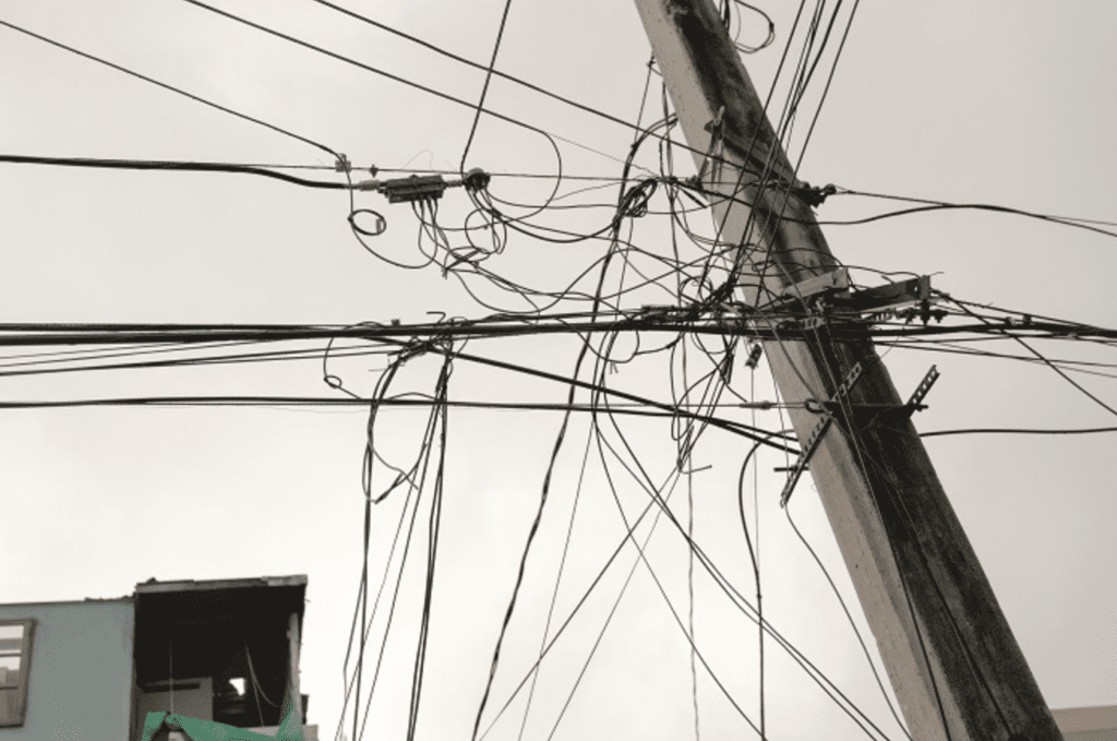 Tangled power lines on this utility pole in Puerto Rico.
