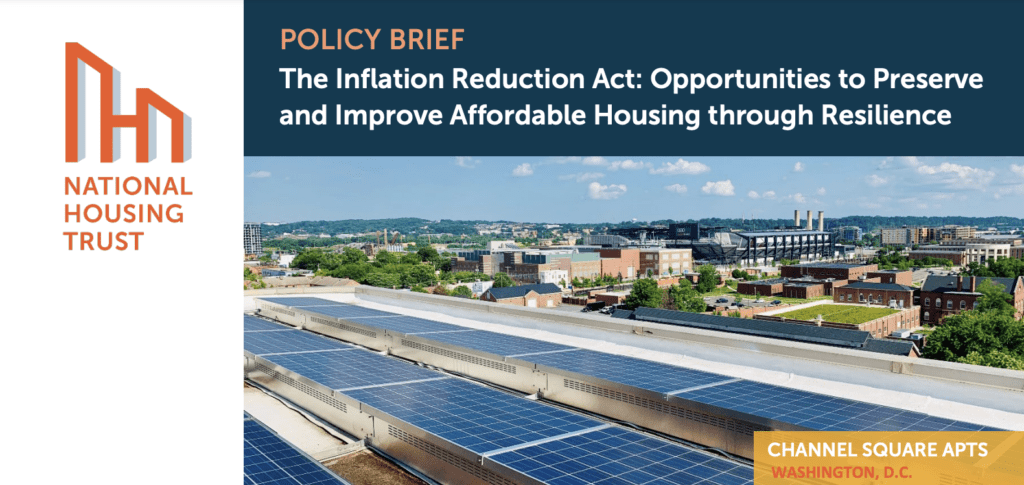 National Housing Trust: Policy Brief on IRA Opportunities for Affordable Housing Image of a city skyline with solar panels on a rooftop.