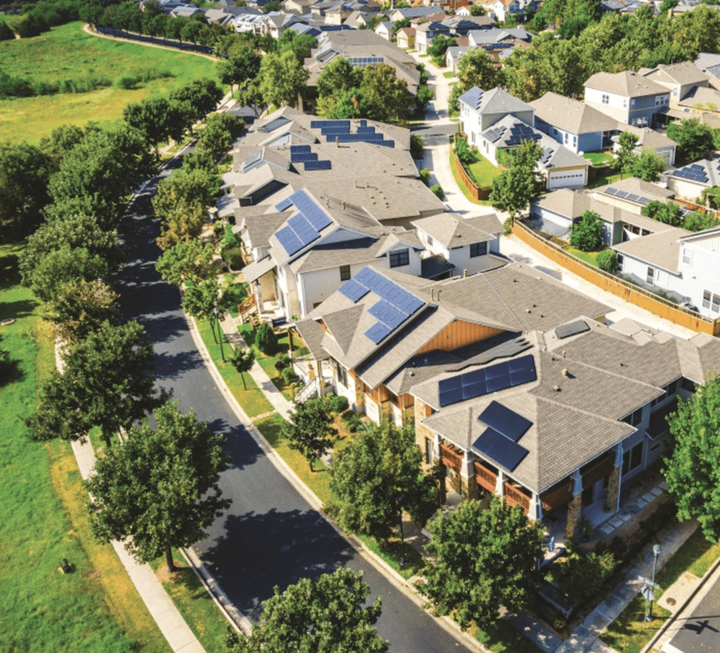 Solar panels on roofs of suburban homes