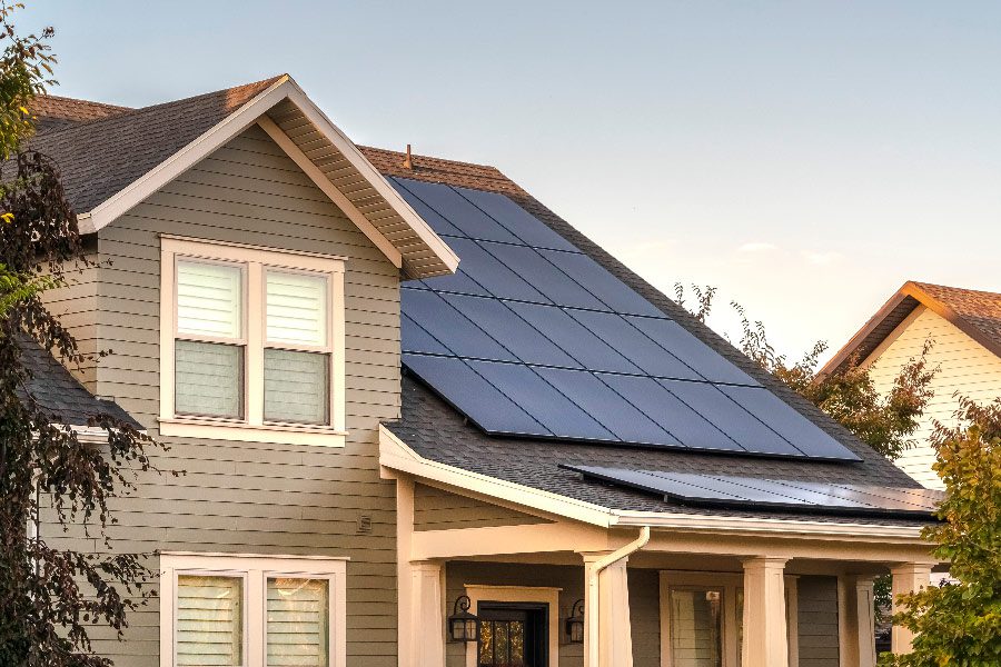 Exterior of a home with solar panels on the roof