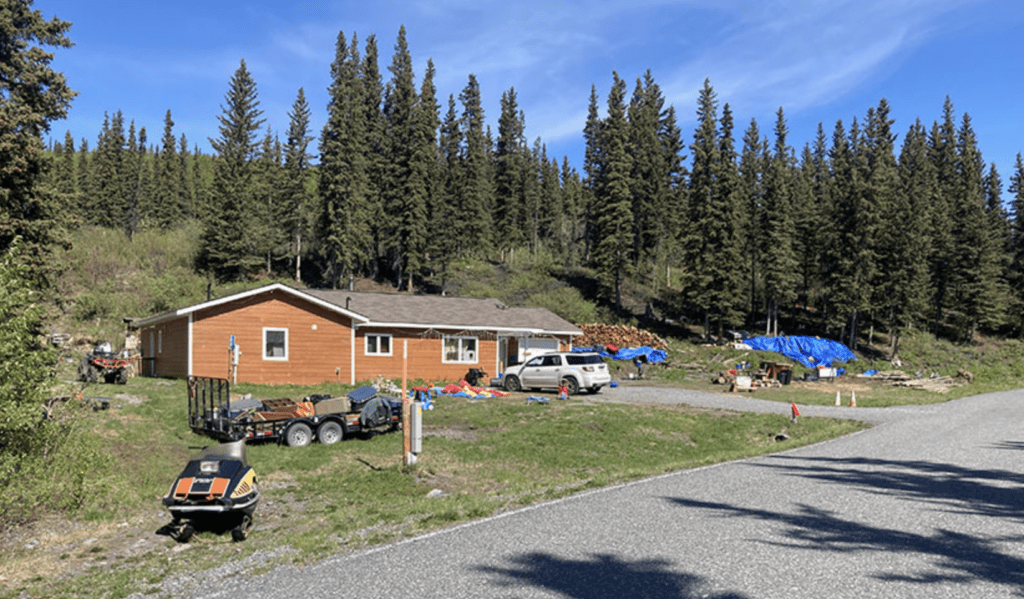 Roselynn Neeley's house, built in 2010, has had settling problems from the beginning. As the ground underneath the house has thawed and settled, her foundation walls have sunk and slumped inward, creating a bow in the middle and throwing everything out of level. In Summer 2023, a crew leveled the house. Photo by NREL