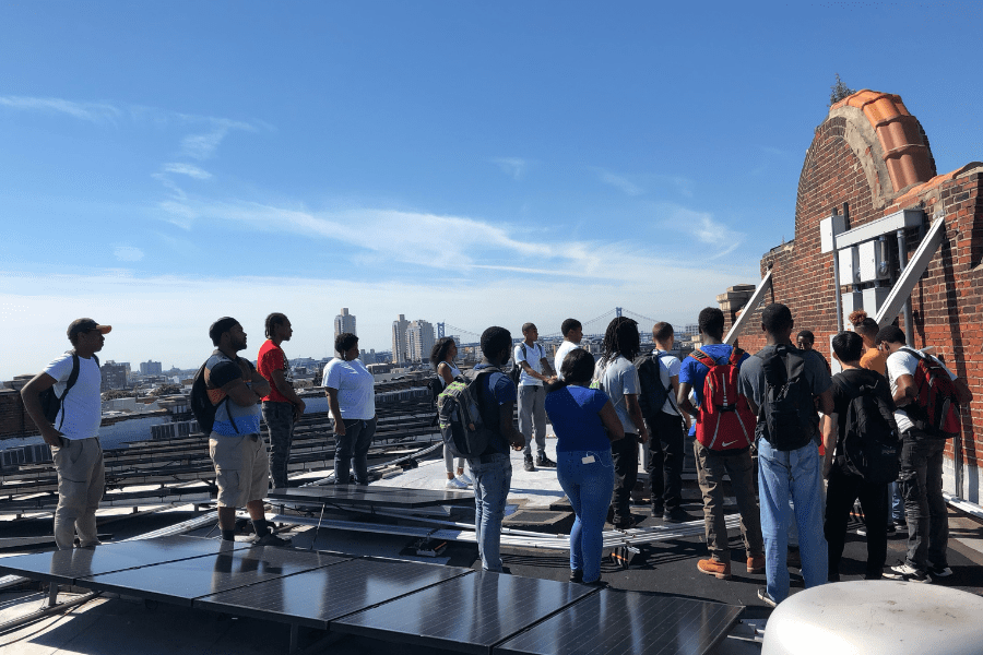 Group of people during training on rooftop