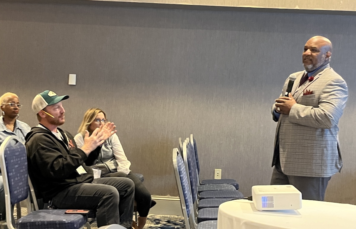 Session presenter speaking to attendees, taken at BPA's 2025 New England Regional Home Performance Conference and Trade Show